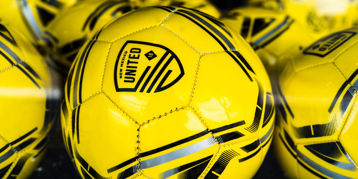 New Mexico United yellow soccer balls